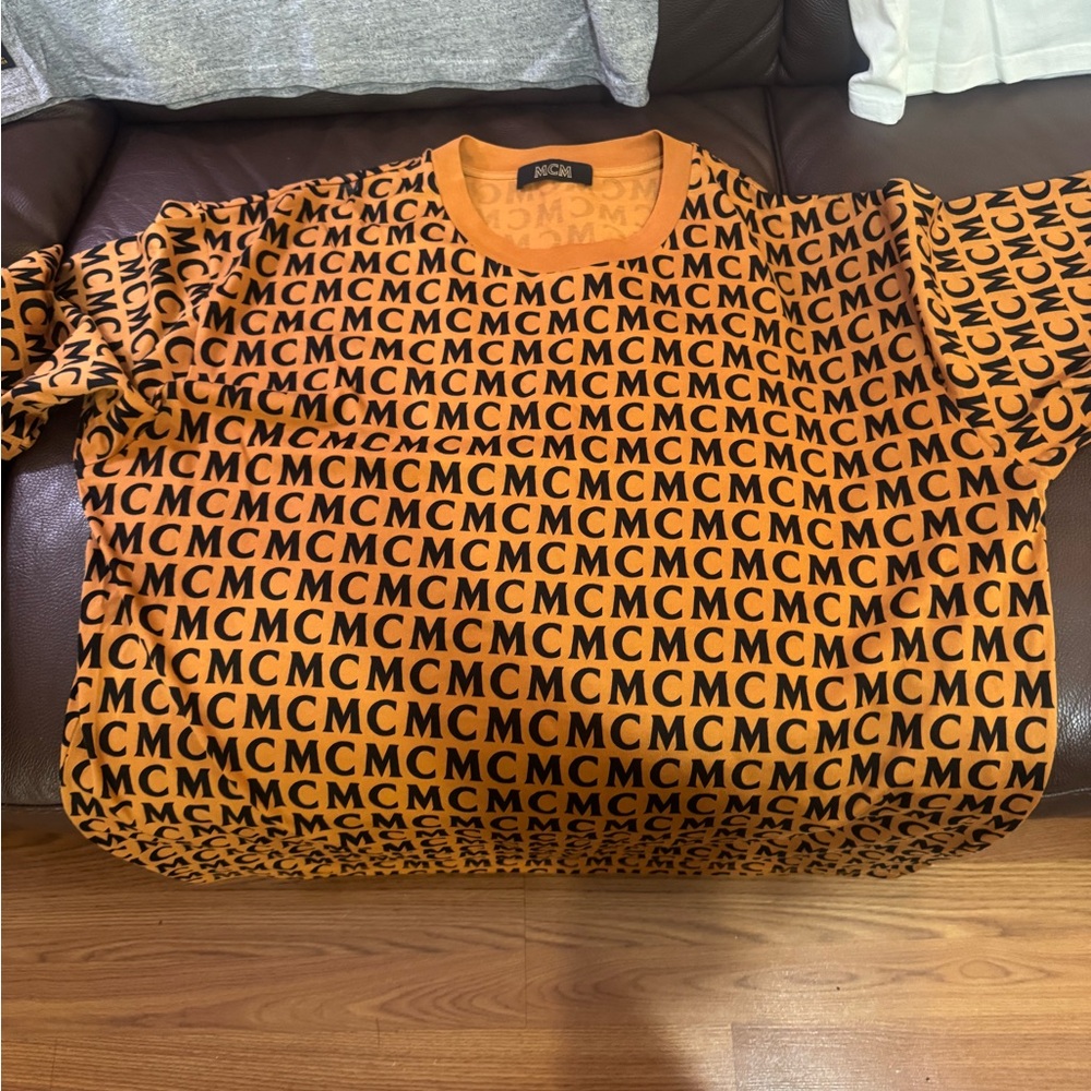 Lot of designer high end shirts.